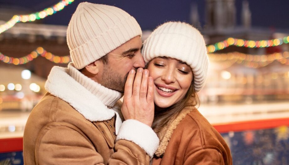 Couple,In,Love,Walks,On,The,New,Year’s,Street,Of