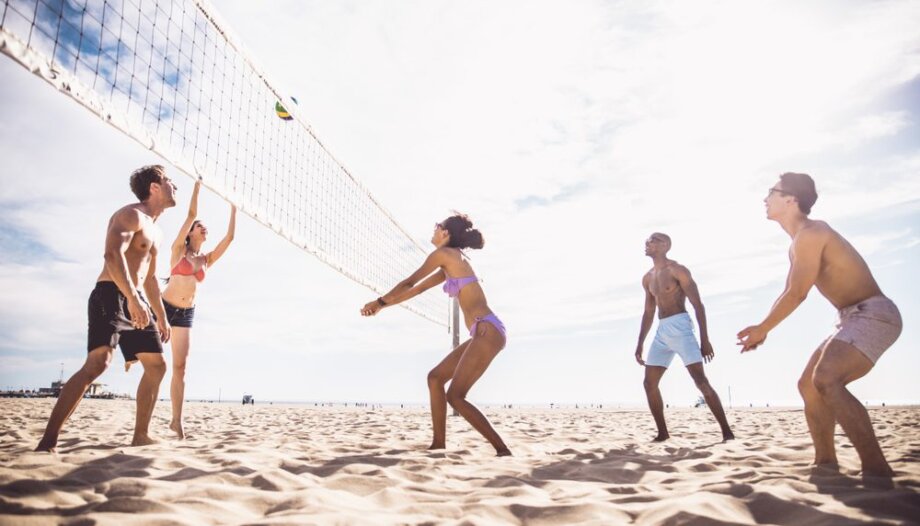 Group,Of,Friends,Playing,Beach,Volley,-,Multi-ethic,Group,Of
