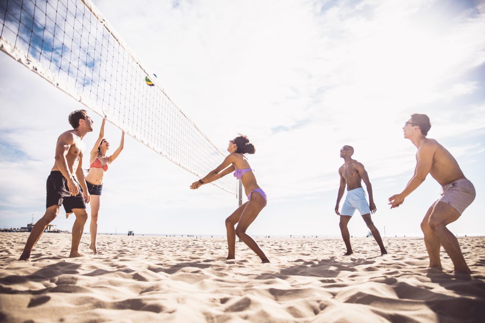 Group,Of,Friends,Playing,Beach,Volley,-,Multi-ethic,Group,Of